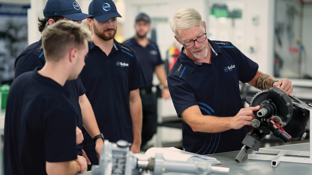 Invest Auckland - News - Salus Aviation employees working on engine